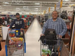 Homeless veterans Rafael and Jesse shop at Walmart in this photo. Dr. Joe Guettler of UnaSource Surgery Center began a drive to assist these two Oakland County, Michigan men.