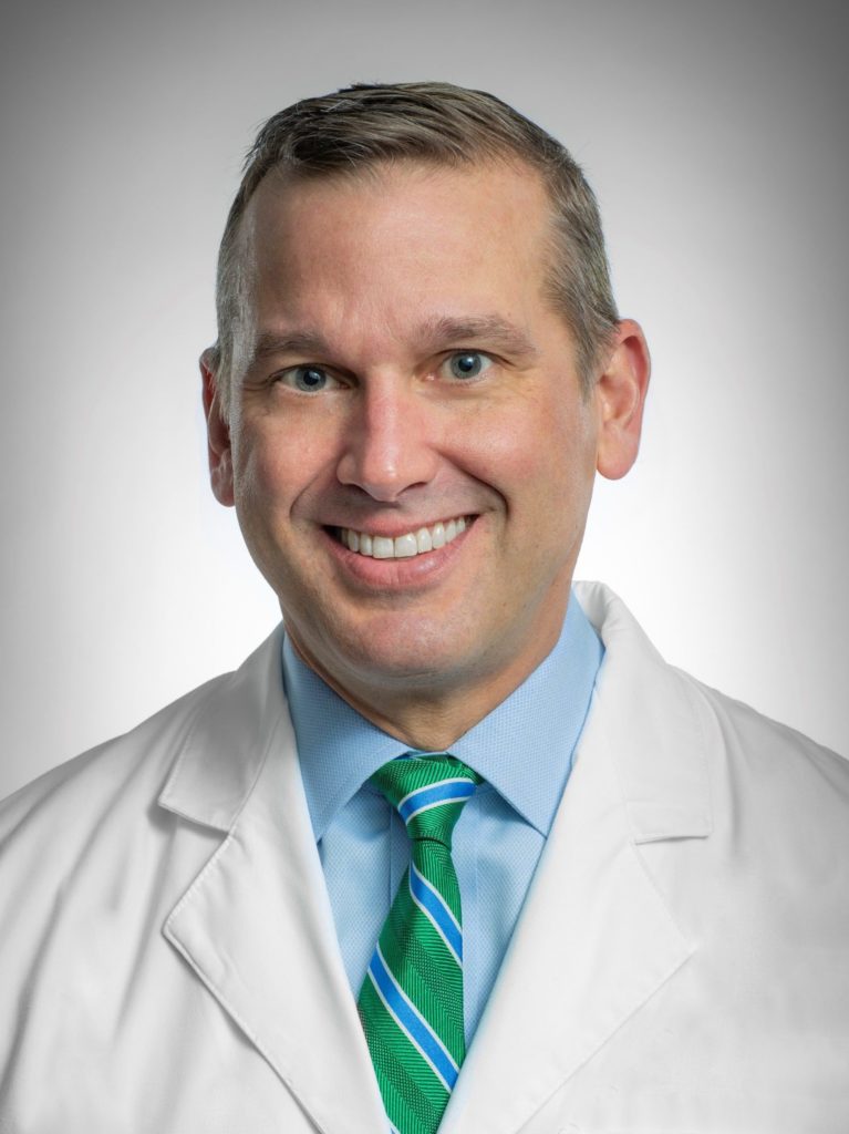 Headshot of Dr. Nicholas Dutcheshen is an orthopedic surgeon who specializes in sports medicine and shoulder surgery in Troy, Michigan.