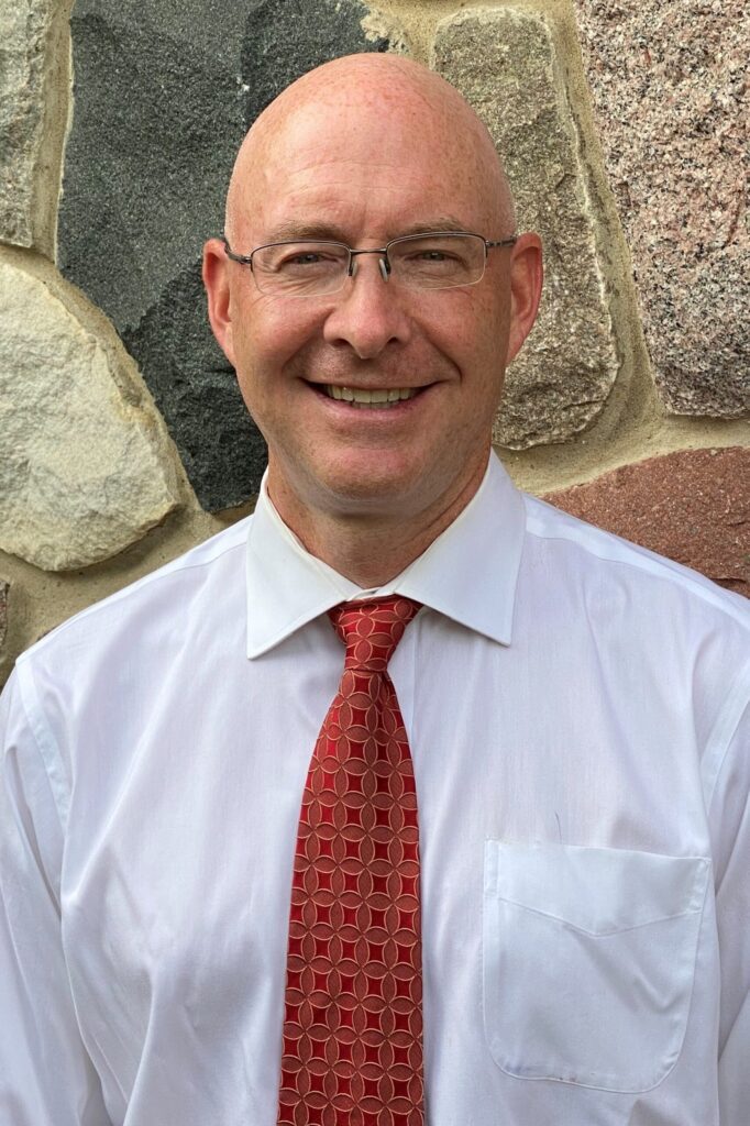 Dr. C. Christopher Stroud, shown here in a headshot, specializes in orthopedic surgery in Troy, Michigan.